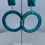 Thumbnail: Sterling Silver Peacock Blue Hoop Earrings