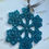 Thumbnail: Peacock Blue Glitter Snowflake Ornament with 2022 Mirrored Tag