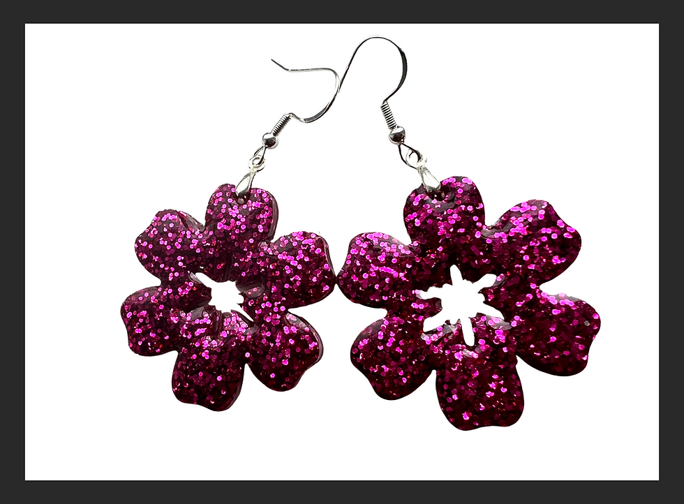 Thumbnail: Lightweight pink glitter flower earrings add a touch of everyday sparkle to any outfit.