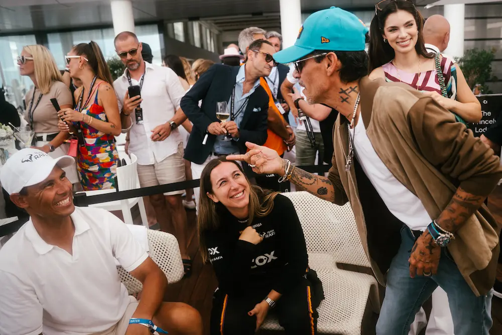 Marc Anthony chats with fellow E1 Series team owners on the dock during race weekend in Monaco