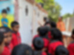 Students from a government school inaugurating a toilet
