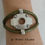 Miniature : Bracelet chic et original cuir rond kaki et son passant industriel, fermoir croc