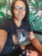 Coffee break from Lyft at Starbucks and looking at new business cards - Copyright Vanessa Simmons