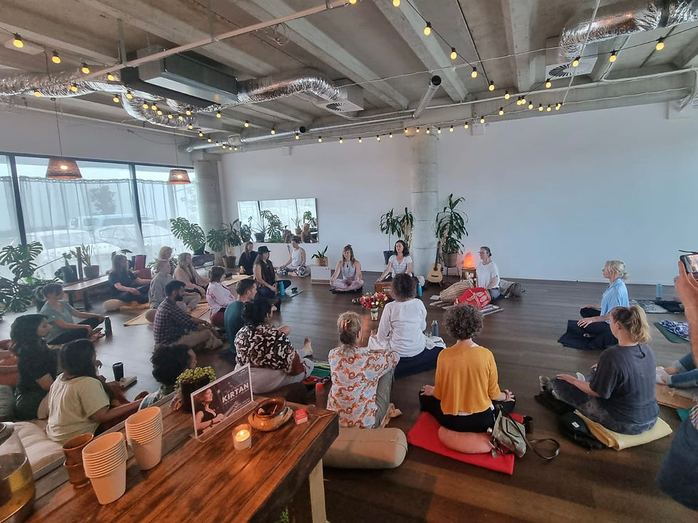 a yoga studio for venue hire space, workshops, and events. 20 people gather in a circle