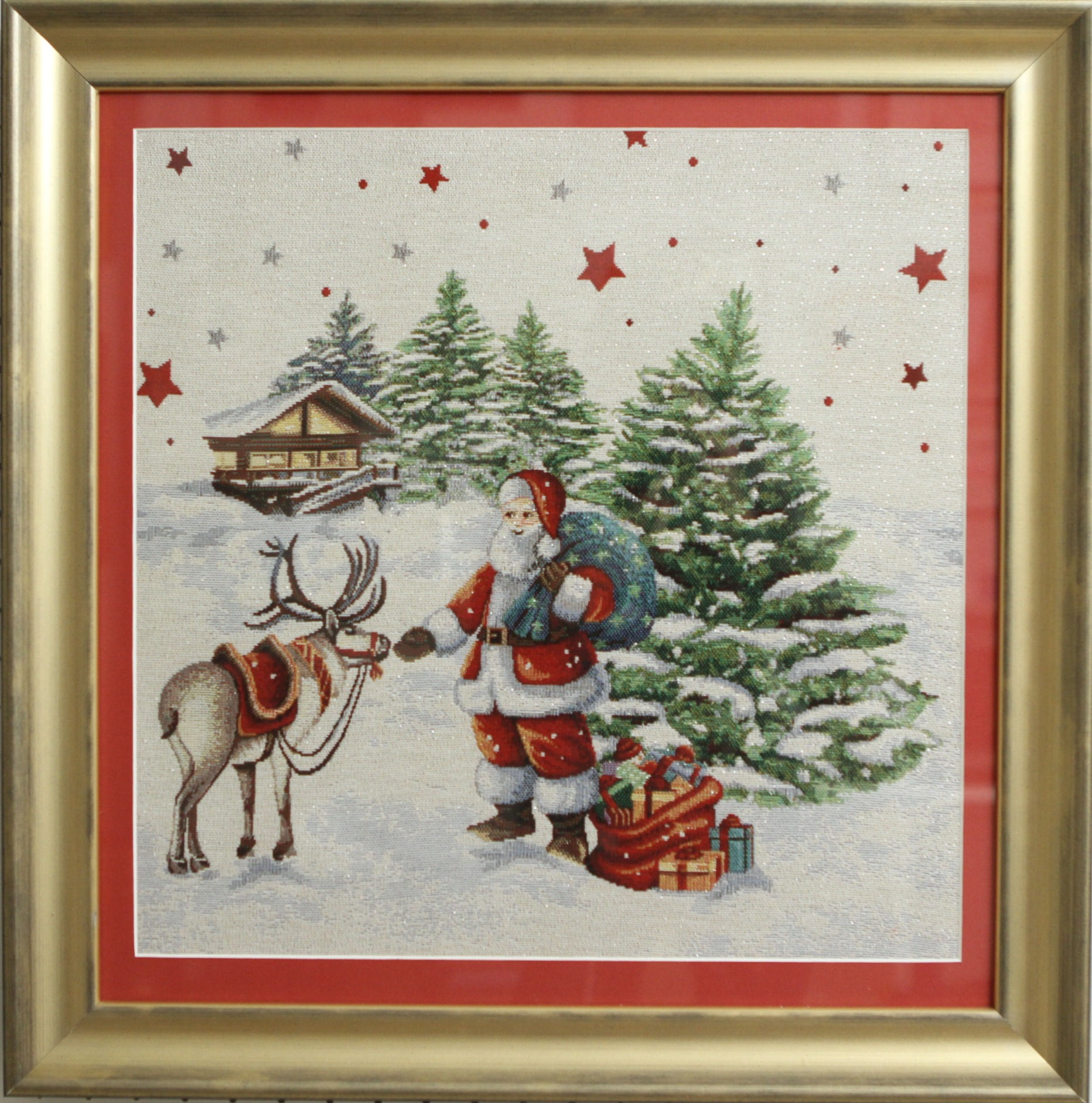 Embroidered Santa with chalet and reindeer, gold and black frame