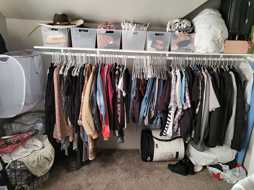 client's closet organized with space between hangers