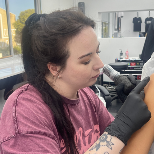 Clare, apprentice, tattooing at Loco Tattoo