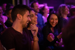 Friends laughing at Basel English Stand Up Comedy Show from Comedy Kiss