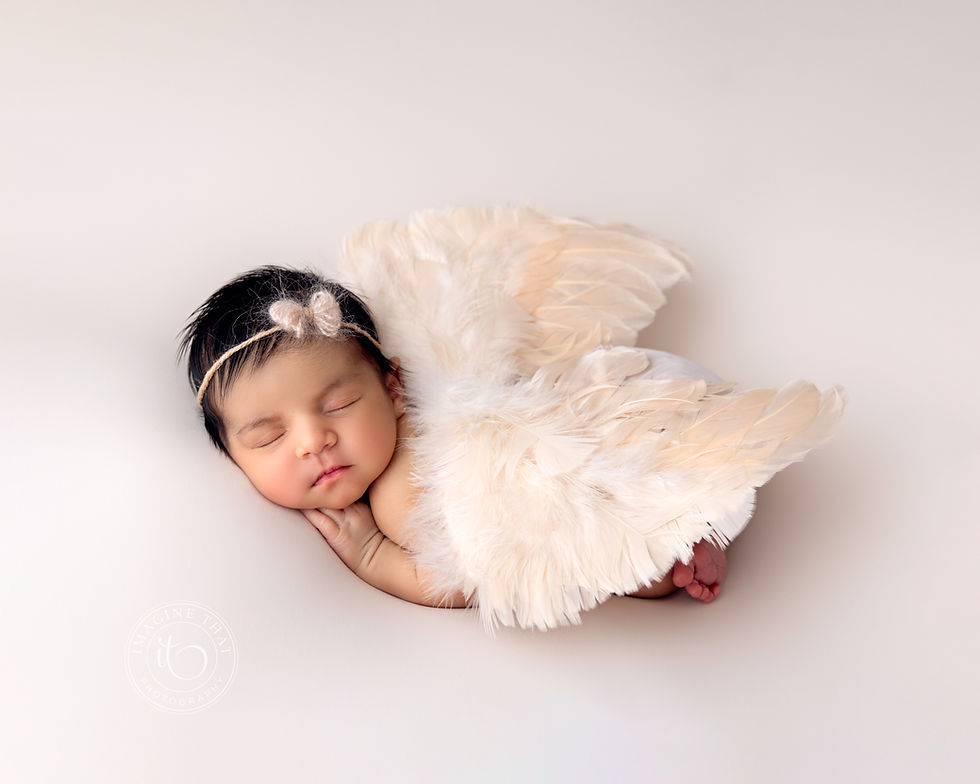 Everything You Need to Know Before Booking a Newborn Session at Imagine That Photography