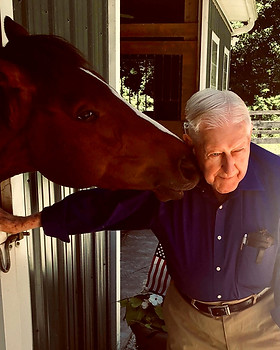 Lucky & Col Hughes.jpg