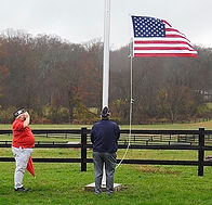 American Legion raising flag.jpeg