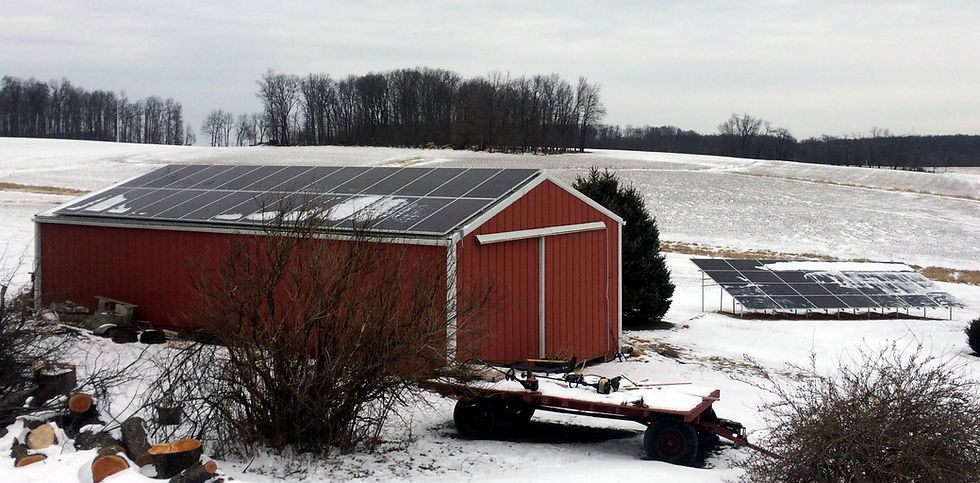 snow on farm solar panels