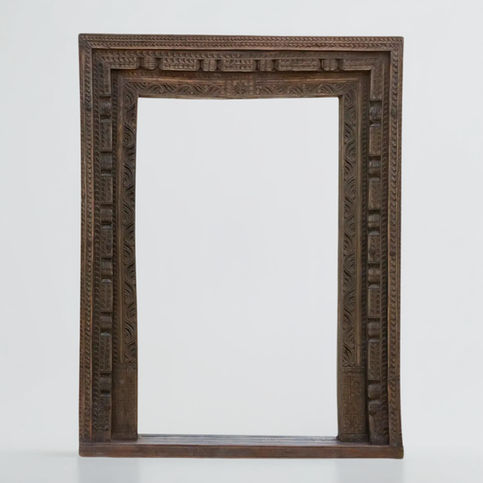 carved wooden Indian mirror