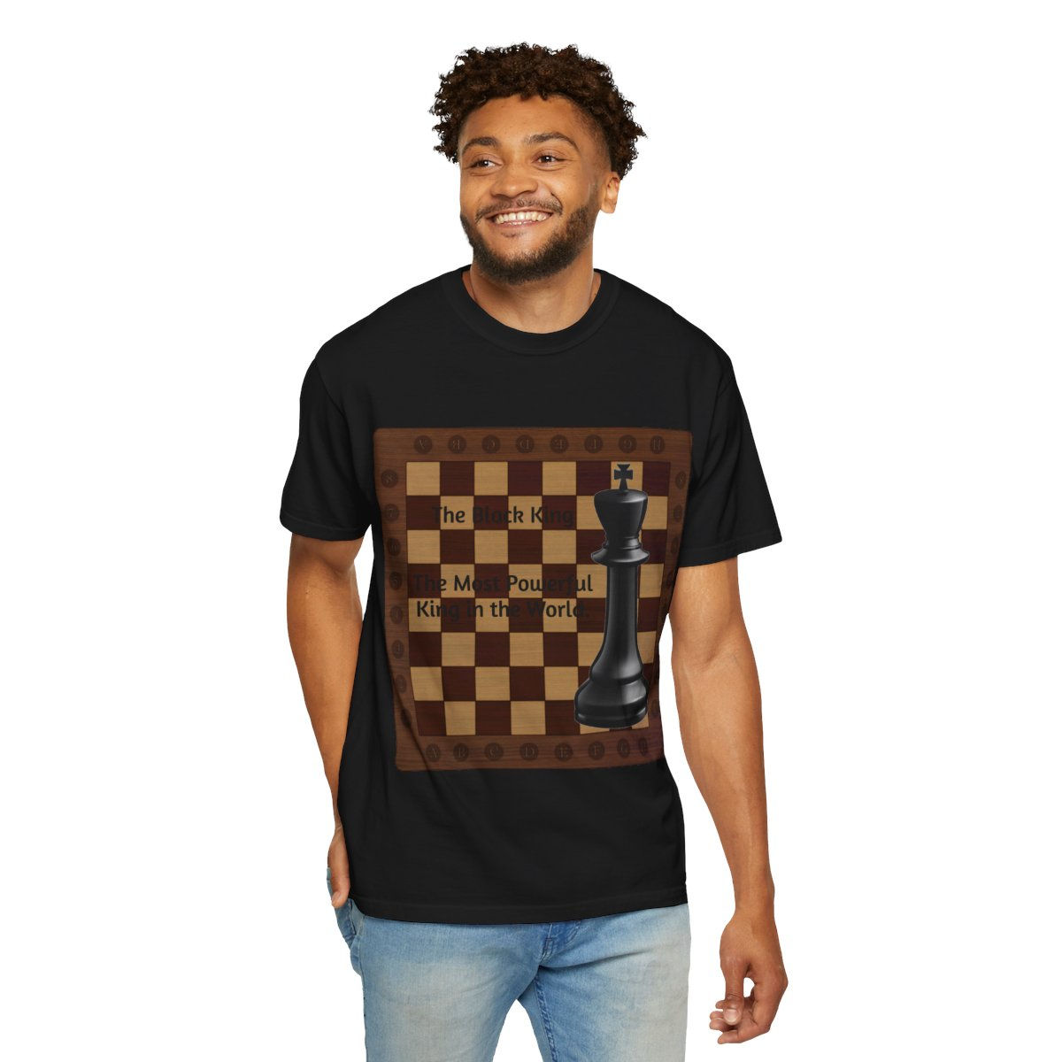 Man smiling in black t-shirt with chessboard design