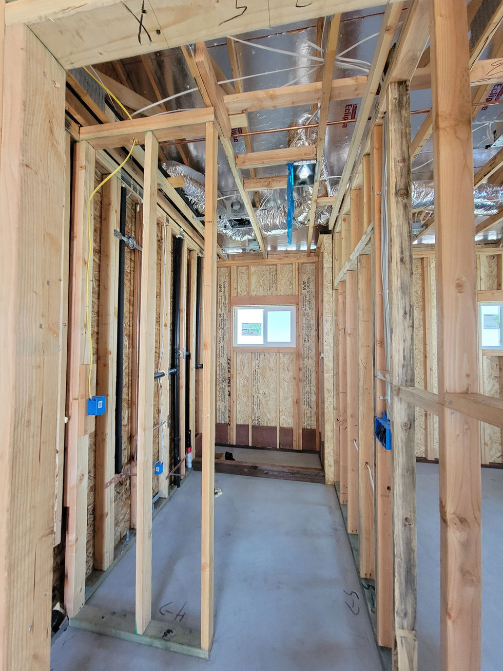 a room that is being built with a window and a sign that says ' a ' on it