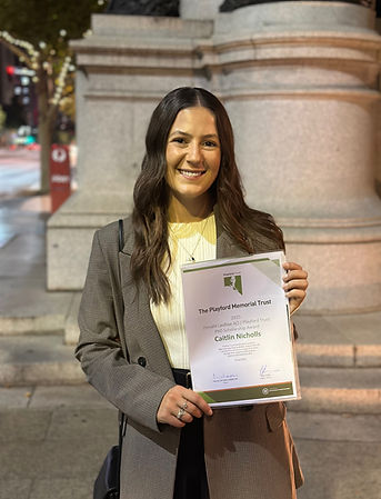 Caitlin Nicholls with the Playford Trust award