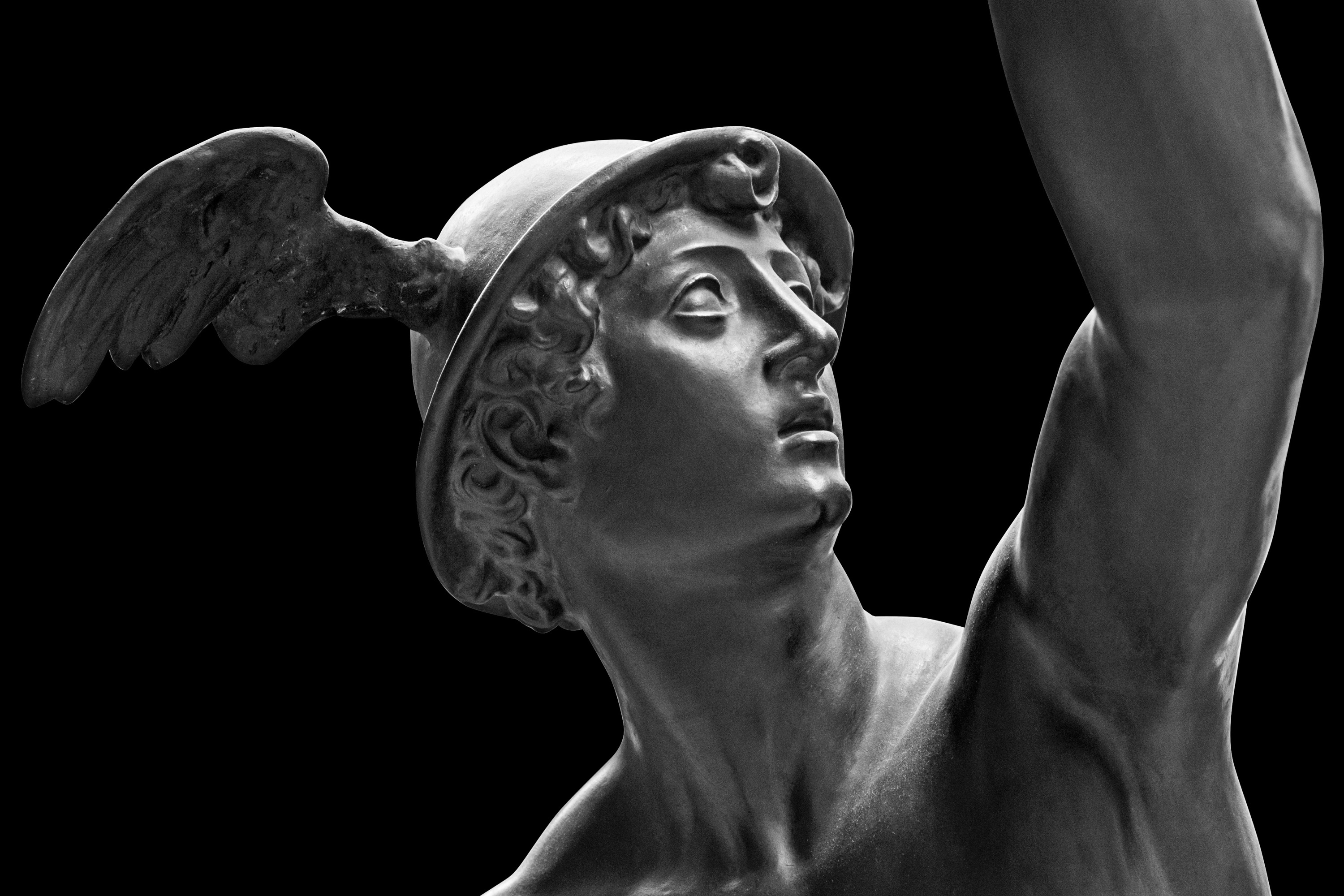 Ancient statue of the antique god of commerce, merchants and travelers Hermes - Mercury. H