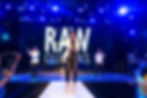 A Photo of Singer, K Davis, Performing Live on Stage in New York.