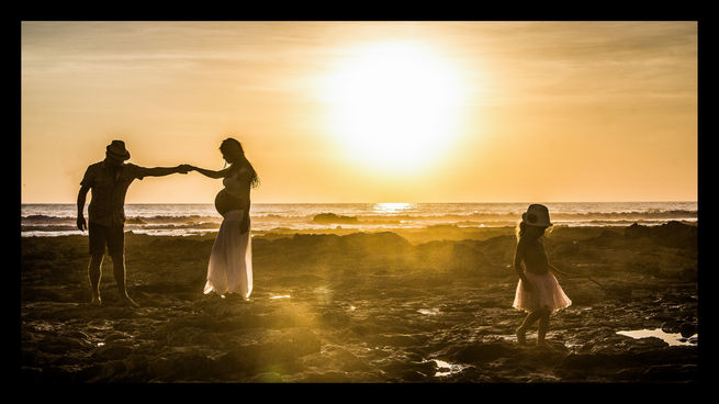 Couple portrait photography at sunset on the beach in Costa Rica