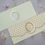 Thumbnail: Moroccan Patterned Off White and Orange Ganesh Wedding Invitation Card