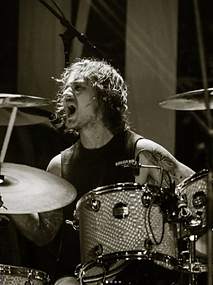 Luke Zajdel, touring drummer, using REZO custom drum heads