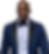 Smiling man in a blue tuxedo with a black bow tie.