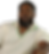Black man with a beard wearing a white textured polo shirt.