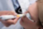 A patient suffering from dry eyes receiving OptiLight IPL treatment