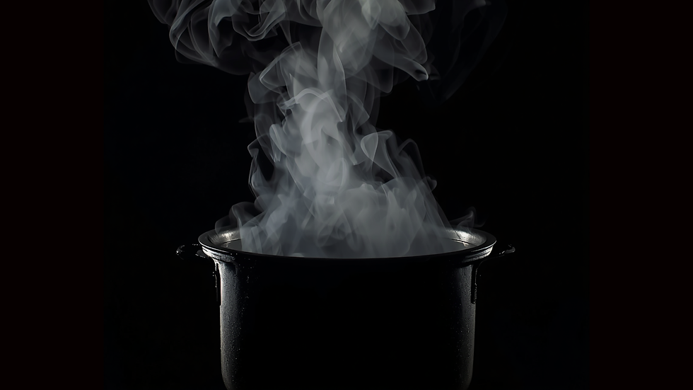 Poling pot of water against a black background
