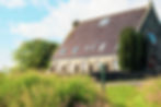 View of church from the forest path.