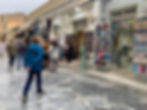 a woman shopping for souvenirs