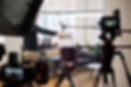 Gut & Grit Media on set filming a video interview.jpeg