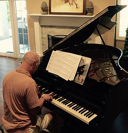 Gene plays a lovely baby grand