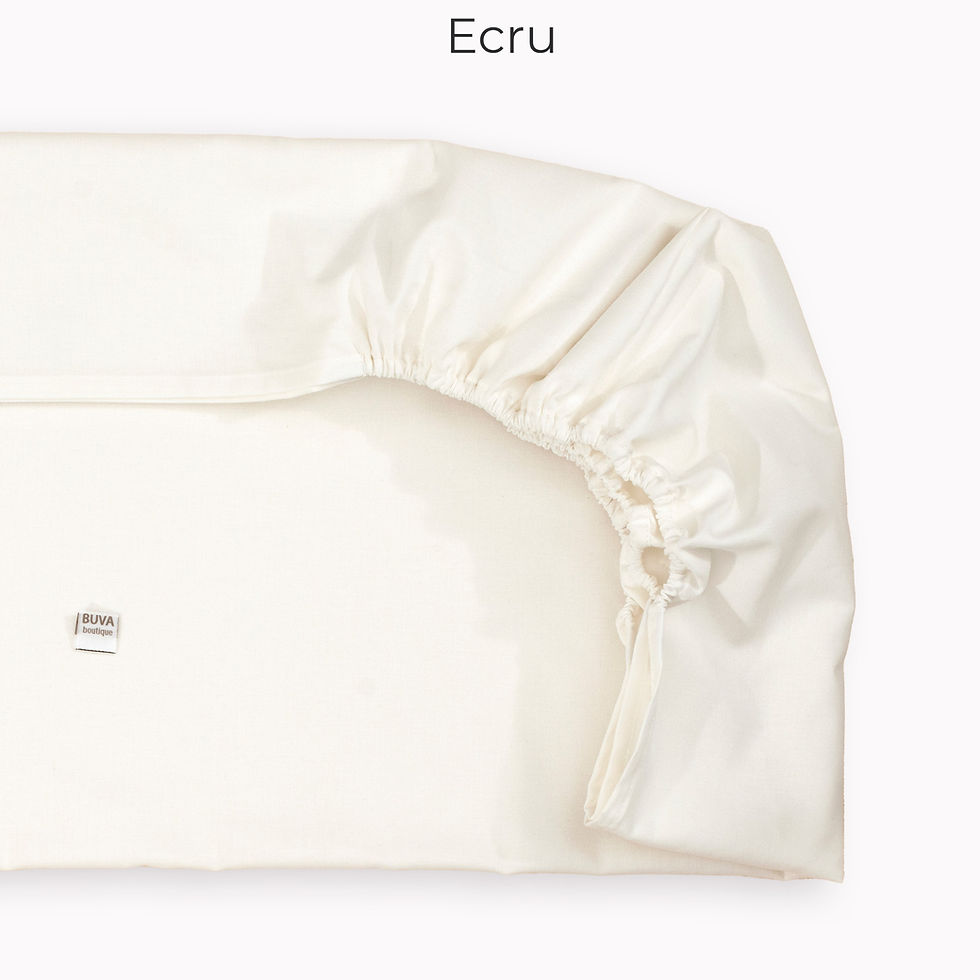 O imagine cu un colt de cearceaf bej pentru patut copii