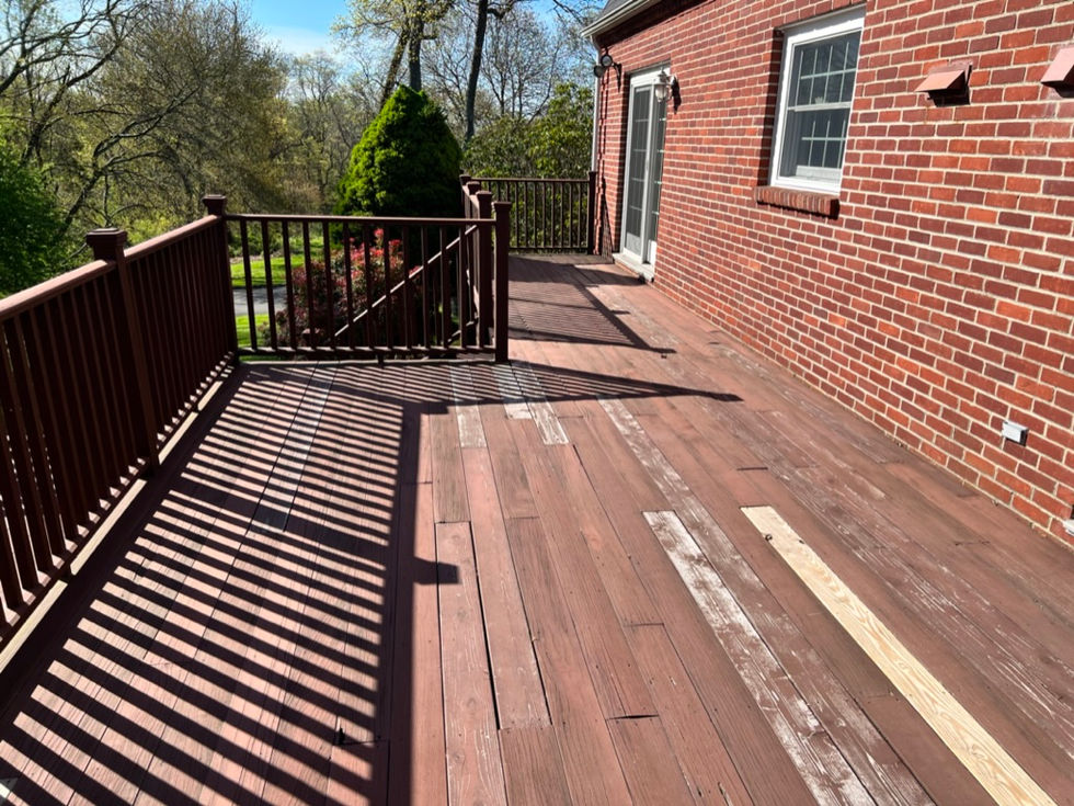 New deck construction build with moisture shield decking and Trex transcend rails with cocktails rails in Easton, CT.
