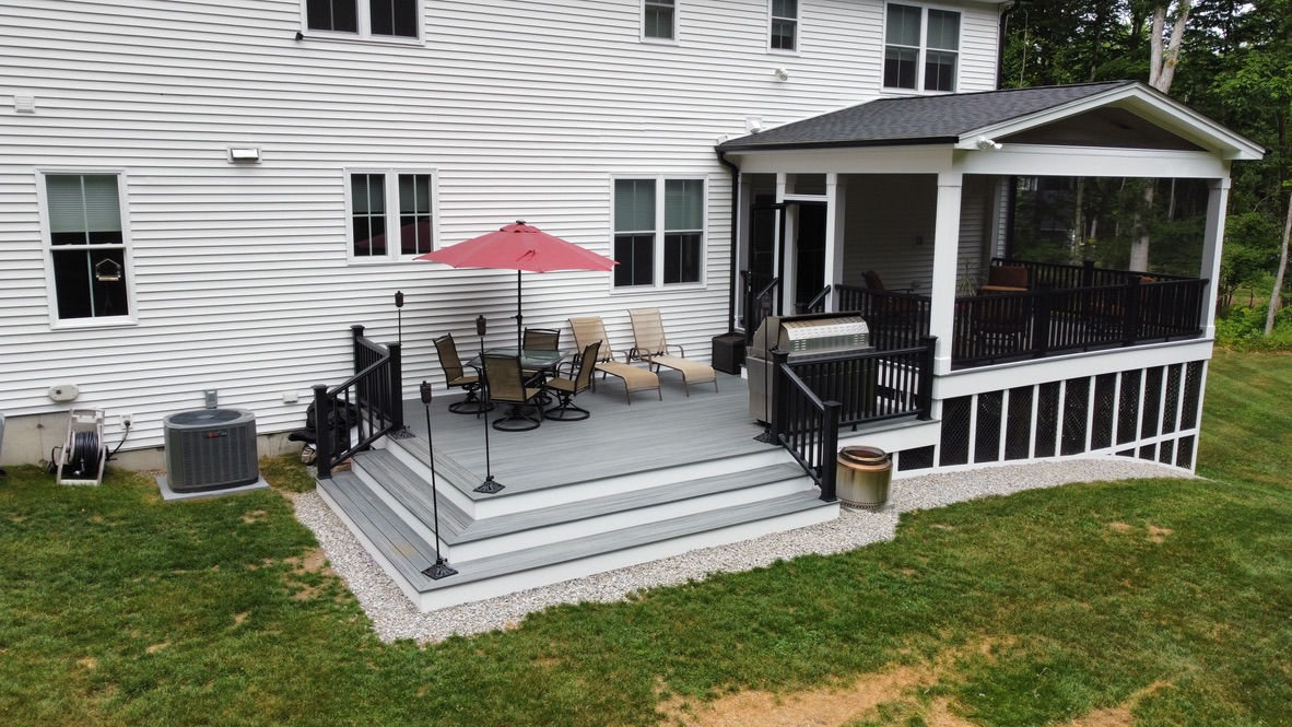Custom Trex deck with white rails and picture-frame border built in Newtown, Connecticut