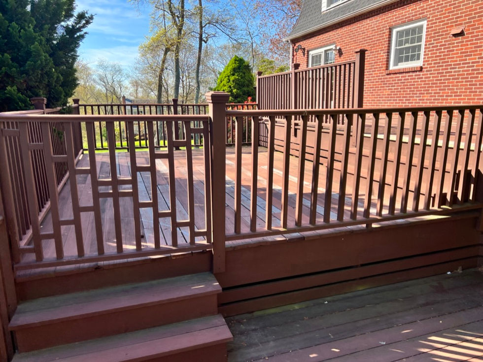 New deck construction build with moisture shield decking and Trex transcend rails with cocktails rails in Easton, CT.
