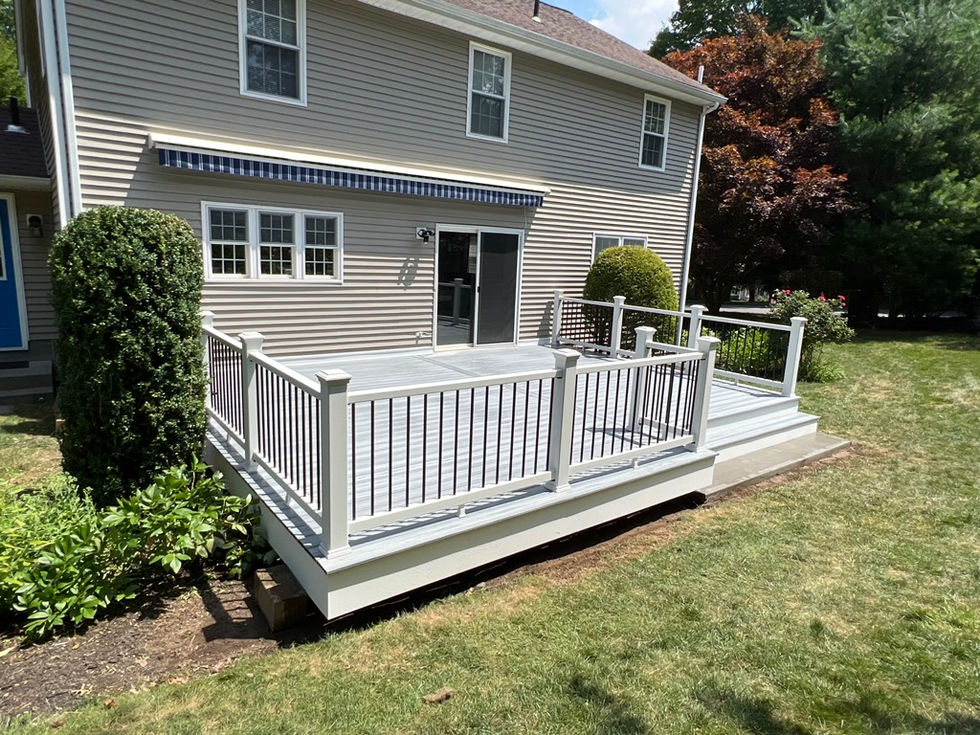 New deck construction with Trex decking and rails in Monroe, CT.