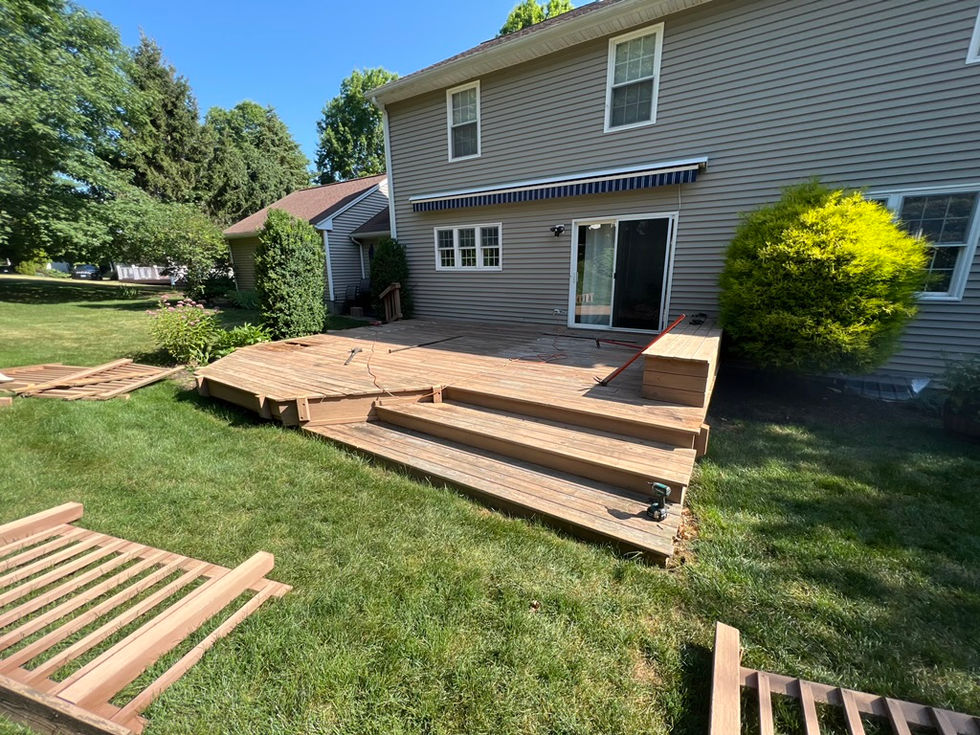New deck construction with Trex decking and rails in Monroe, CT.