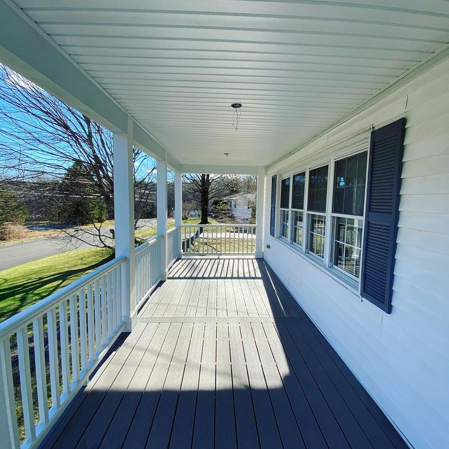 Front porch construction with a roof addition and Trex decking in Shelton, Connecticut