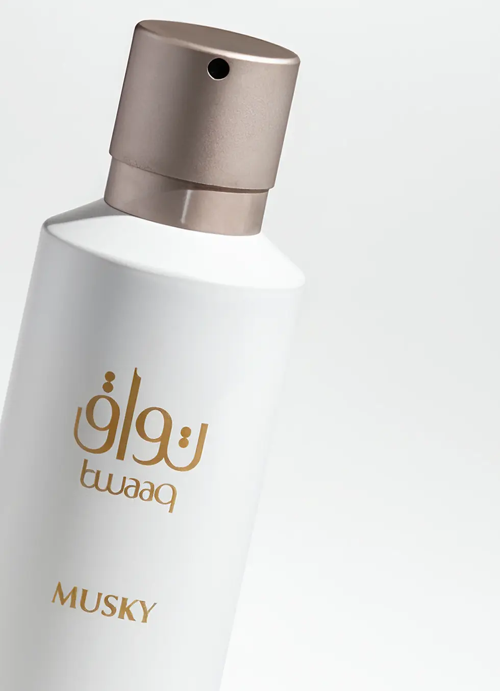 Tawaaq Musky Vanilla All-Over Mist in a sleek white aluminum bottle with a gold-tone ‘On-Off’ Smart Closure, designed by Identiscents, a perfume and packaging company based in Dubai.