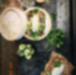 bao buns in a wooden crate