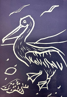 A linocut print of a pelican created at Lavender Art Studios