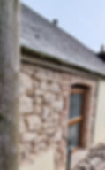 Cement render removal and traditional lime repointing of old English country portland stone and red brick cottage