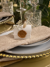 charger plates 
table setting 
Favour
Napkin 