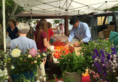 Chester River Landing is a small collection of new homes in Chestertown, MD. Choose from new single family, townhomes, or semi detached homes. Community Community farmers market is pictured.