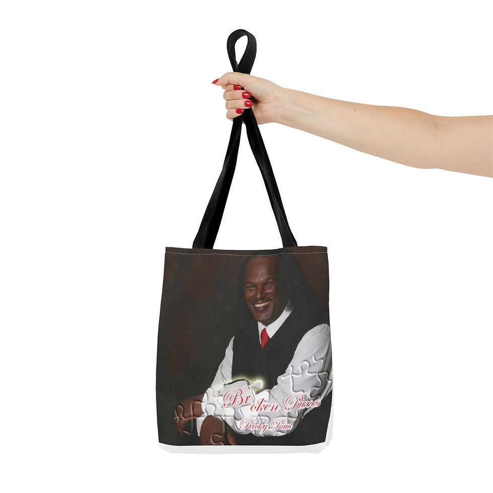 Thumbnail: Hand holding a tote bag with an image on it, smiling man with flowers
