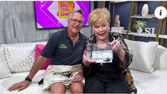 Patty pets a scorpion with Silly Safaris
