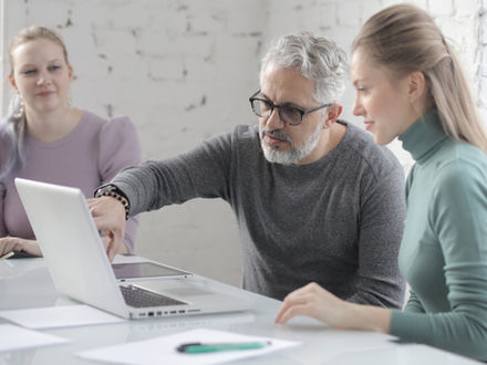 Man and woman at laptop