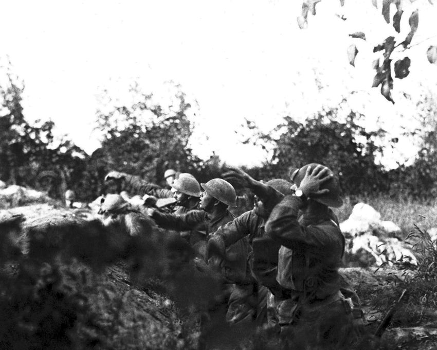 U.S. Troops Throw Hand Grenades in Austrian Trenches